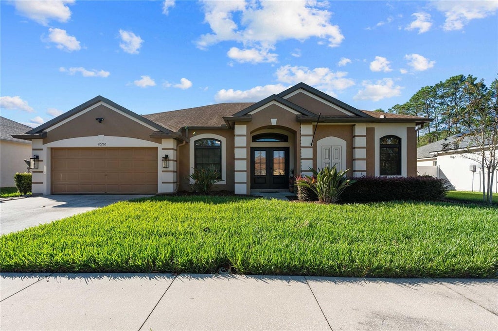 Photo of 20750 Orchardtown Drive, Land O Lakes, FL 34638 (MLS # TB8558113)