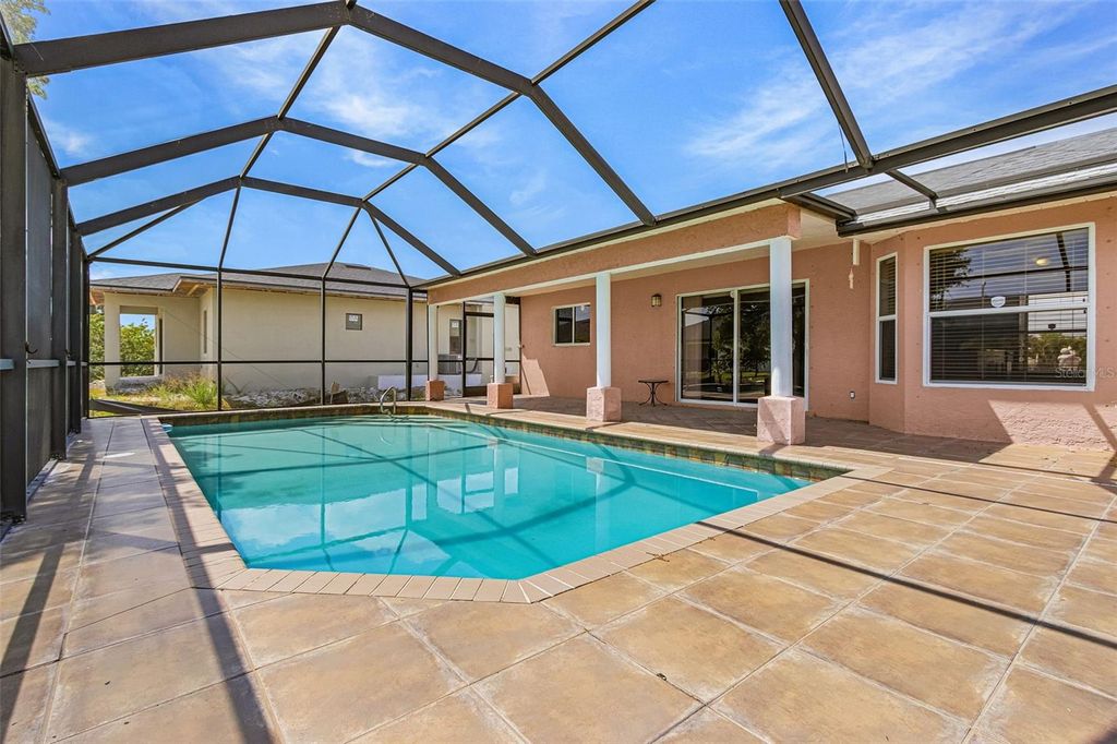 Photo of 2442 Embers Parkway W, Cape Coral, FL 33993 (MLS # TB8498842)