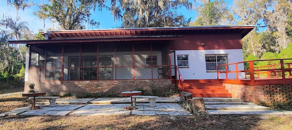 Photo of 17466 Lake Iola Road, Dade City, FL 33523 (MLS # TB8448994)