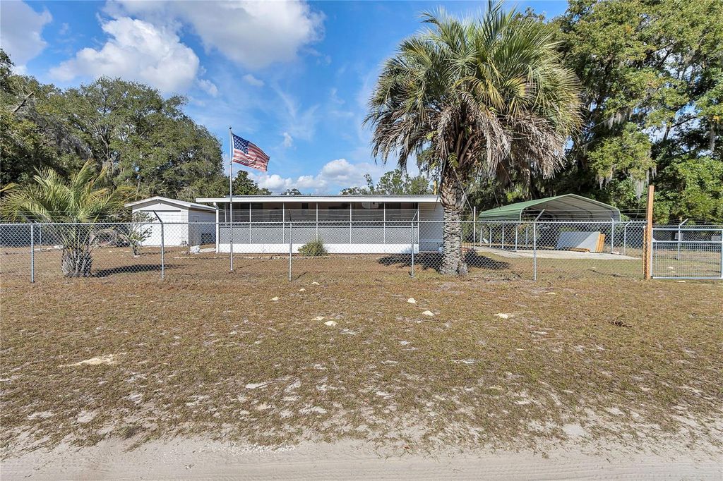 Photo of 3003 NE 165th Place, Citra, FL 32113 (MLS # OM716437)