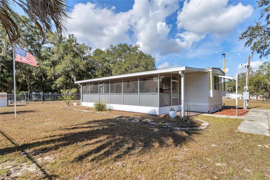 Photo of 3003 NE 165th Place, Citra, FL 32113 (MLS # OM716437)