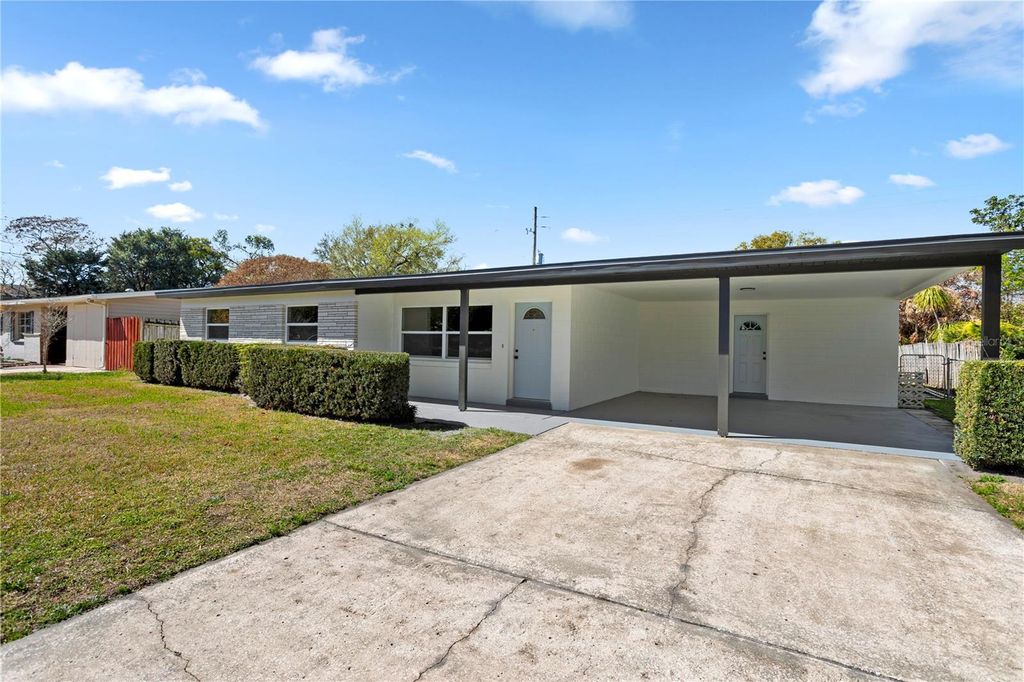 Photo of 1628 Larkin Avenue, Orlando, FL 32812 (MLS # O6385250)
