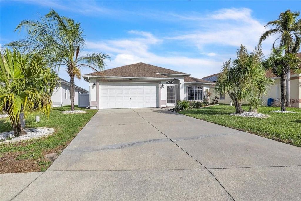 Photo of 8571 Gassner Way, Lehigh Acres, FL 33972 (MLS # TB8493105)