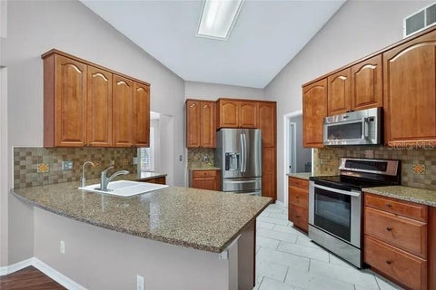 Tiny photo for 112 Madrona Drive, Eustis, FL 32726 (MLS # TB8560837)