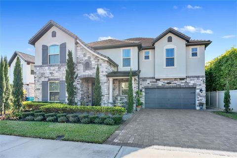 Photo of 10710 Belle Maisons Drive, Orlando, FL 32832 (MLS # O6358897)