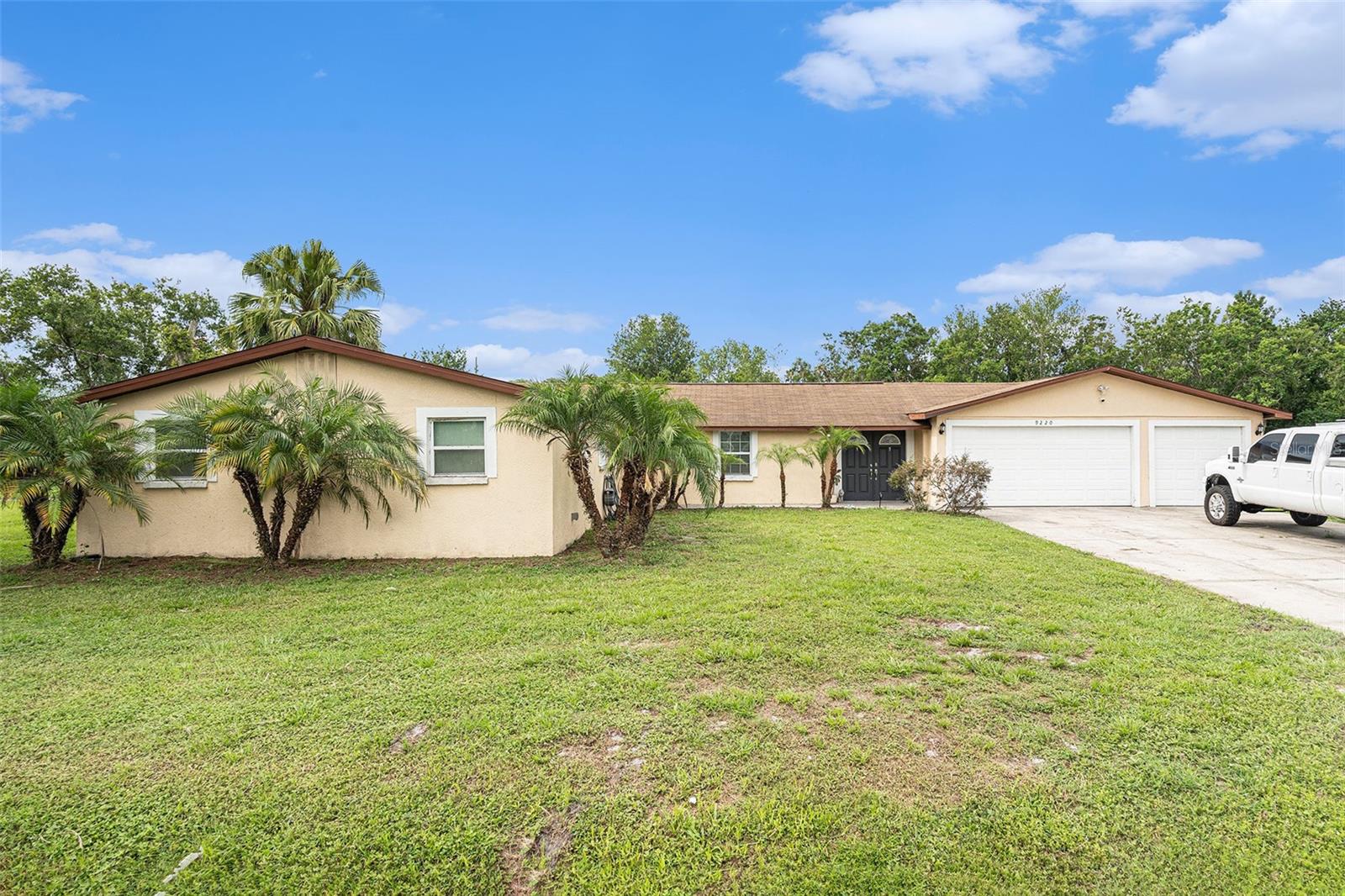 Welcome to your peaceful retreat in the heart of Dover! This well-maintained 3-bedroom, 2-bathroom home sits on a spacious 1-acre corner lot and offers a perfect blend of comfort, functionality, and convenience just minutes from I-4 and a short drive to all that Tampa has to offer. Step into a bright and open living space featuring a stylish kitchen with stainless steel appliances, a large island, and solid wood cabinetry for ample storage. Automatic blinds in the kitchen add a modern touch, while the reverse osmosis system and water softener offer added peace of mind. The septic system was serviced in November 2024, and a brand new electrical panel was installed just 2.5 years ago, making this home move-in ready and worry-free. This home includes a dedicated office space, a laundry area with storage, and a 3-car garage, providing all the room you need for work, hobbies, and organization. The primary suite features a walk-in closet, dual sink vanity, and a relaxing soaking tub. Enjoy the outdoors from your screened-in porch, or let pets and little ones roam freely in the fully fenced yard. Located just 10 minutes from Keel Farms, under 20 minutes to the Florida State Fairgrounds and MIDFLORIDA Amphitheatre, and less than 25 minutes to Downtown Tampa, this home offers country charm with unbeatable access to shopping, dining, and entertainment. Don’t miss your chance to own this gem in a prime location—schedule your showing today!