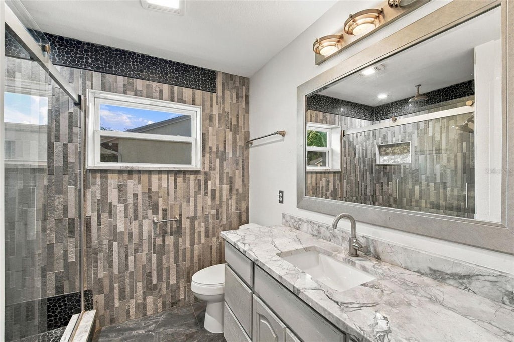 Photo of 7958 Glen Abbey Circle, Orlando, FL 32819 (MLS # O6453043)