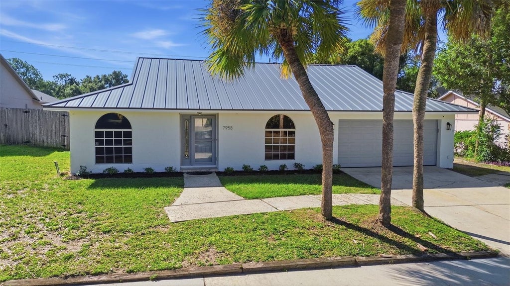 Photo of 7958 Glen Abbey Circle, Orlando, FL 32819 (MLS # O6453043)