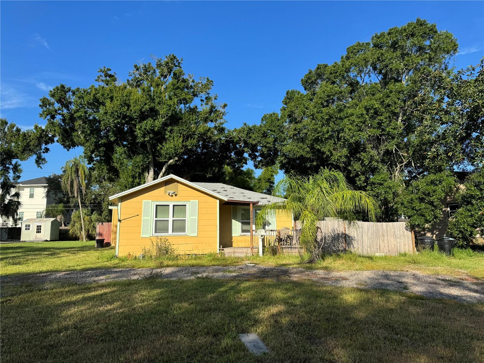 Don’t miss this rare chance to build in one of St. Petersburg’s most desirable and fast-growing neighborhoods. Situated on a generous 8,525 sq ft lot, this property is perfectly positioned directly across from the brand-new Mangrove Bay Middle School and the state-of-the-art Speer YMCA. The existing home sustained flood damage during Hurricane Helene but has already been professionally remediated. A FEMA 50/50 letter is in place, requiring that future improvements meet FEMA’s rebuilding rule—making this an ideal site for a brand-new build. Surrounded by modern new-construction homes, this lot offers exceptional potential whether you’re looking to create your dream residence or a high-demand investment property. Additional highlights: Just minutes by bike or golf cart to the Downtown Waterfront, St. Pete Pier, marinas, golf courses, dining, shopping, and entertainment. Close to Shore Acres Elementary, parks, and recreation centers with tennis, pickleball, swimming, and kayaking through the scenic Weedon Island Preserve. This is a prime redevelopment opportunity in a sought-after location. Act fast—properties like this don’t come around often!