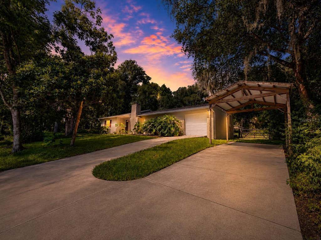 Photo of 410 Ruby Avenue, Deland, FL 32724 (MLS # O6435283)