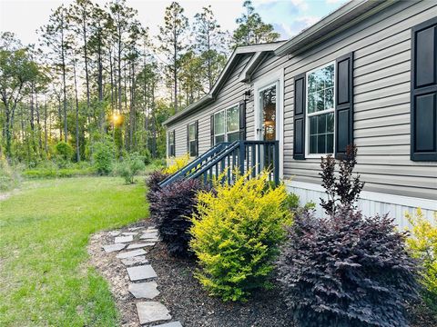 Photo of 14251 SE 21st Place, Morriston, FL 32668 (MLS # OM723508)