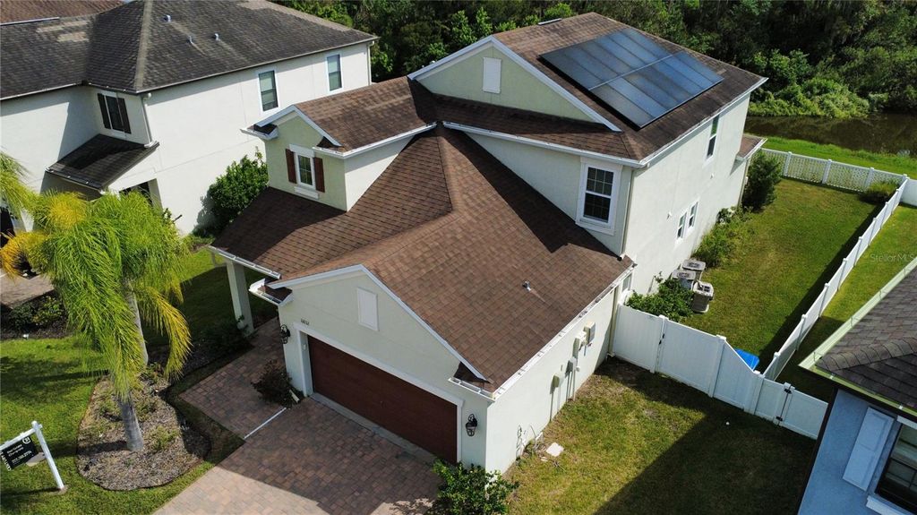 Photo of 11832 Lake Boulevard, New Port Richey, FL 34655 (MLS # TB8433000)