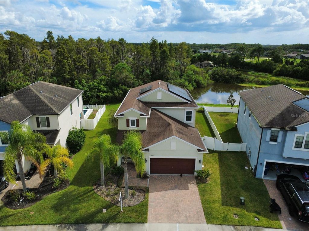 Photo of 11832 Lake Boulevard, New Port Richey, FL 34655 (MLS # TB8433000)