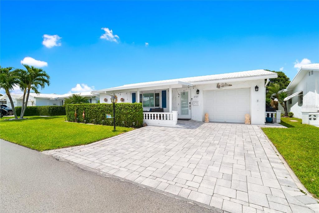 Photo of 2107 SW 22nd Street, Boynton Beach, FL 33426 (MLS # O6399085)