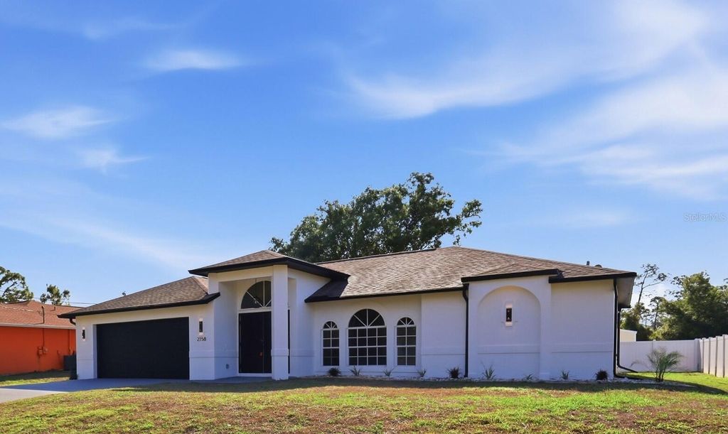 Photo of 2158 Ribbon Terrace, North Port, FL 34286 (MLS # O6394713)