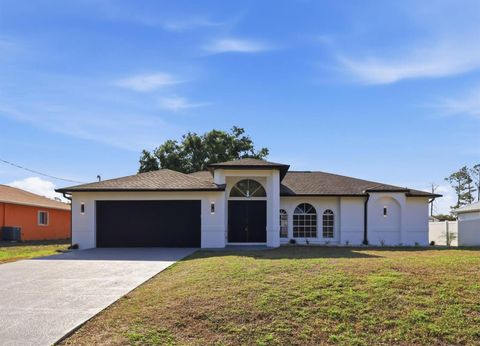 Photo of 2158 Ribbon Terrace, North Port, FL 34286 (MLS # O6394713)