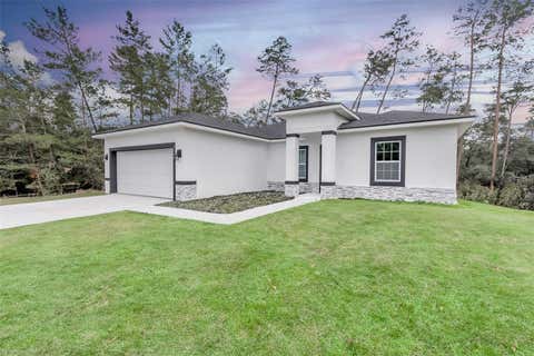 Photo of 3398 SW 165th Loop, Ocala, FL 34473 (MLS # OM730082)