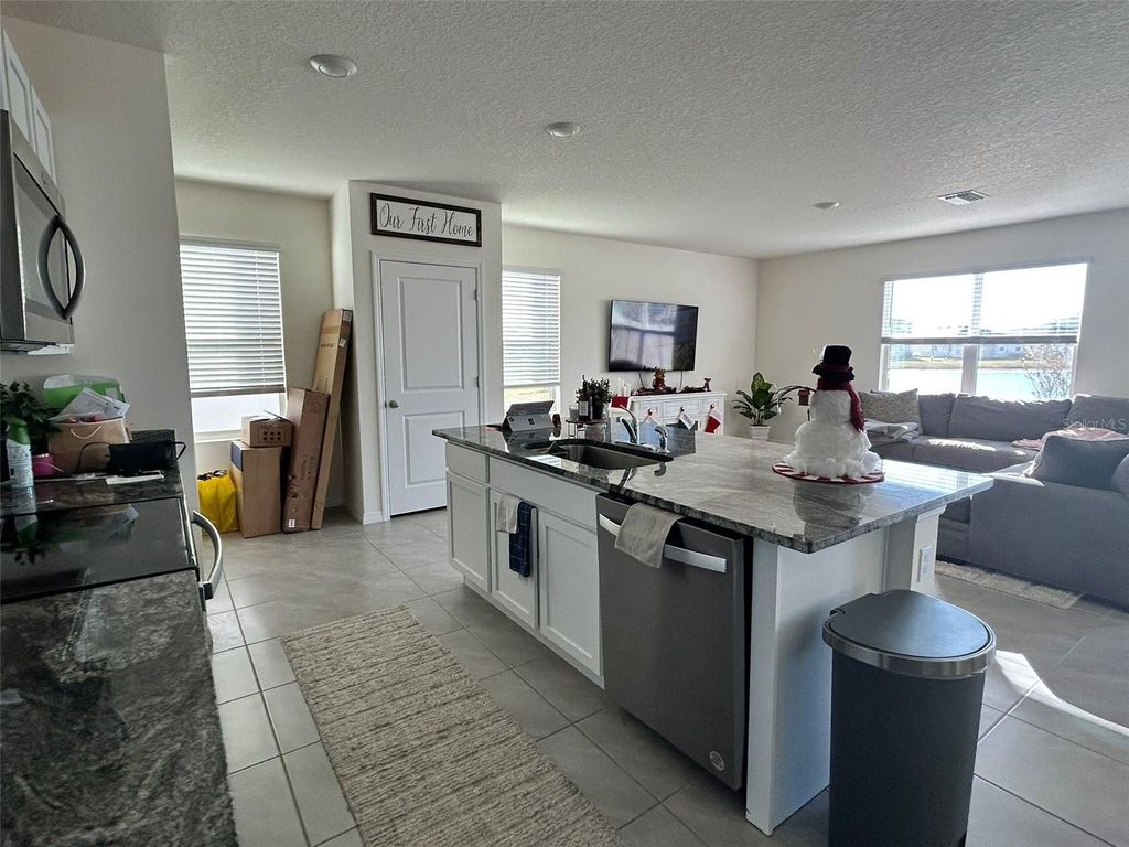 Photo of 8309 Hardy Bay Loop, Wesley Chapel, FL 33545 (MLS # W7882118)