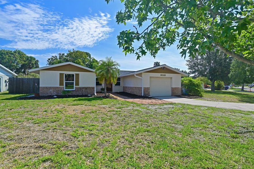 Back on market and PRICED TO SELL! Buyer financing fell through (property and appraisal were good). Welcome to your POOL home just minutes from the white sands of Anna Maria Island. This 3 bed, 2 bath home is centrally located in Cordova Lakes with no HOA, giving you the flexibility for personal use or potential investment property. This block home will provide great peace of mind with a newer roof (2022), AC (2021) and impact windows. The kitchen features new stainless steel appliances (2022) and opens to both the living and dining room for easy entertaining. Step outside the impact sliders to your pool oasis with spacious private backyard featuring mature milkweed plants raising butterflies and palm trees swaying in the breeze. Plenty of room to make this space your own or store your weekend toys behind the locked gate. The master bedroom features plenty of natural light and a spacious ensuite bath. The two guest bedrooms are ready to host and share a recently updated full guest bath. The one car garage is the cherry on top for additional parking and storage space, paired with the long driveway for plenty of off-street parking. This fantastic location is just a short drive to Gulf Beaches,  Bridge Street (beach bars & restaurants), Downtown Bradenton and numerous golf courses; the ultimate Florida lifestyle! Book your tour today!