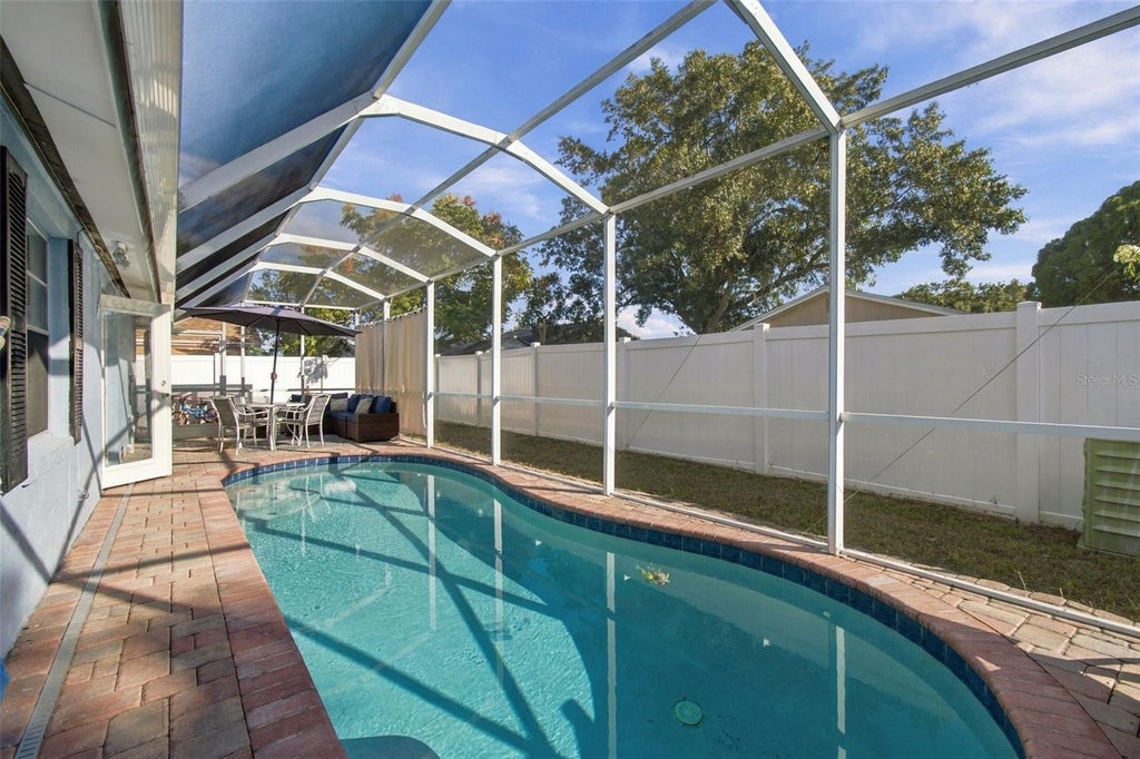 Photo of 10118 Wheatley Hills Court, Tampa, FL 33615 (MLS # TB8560489)