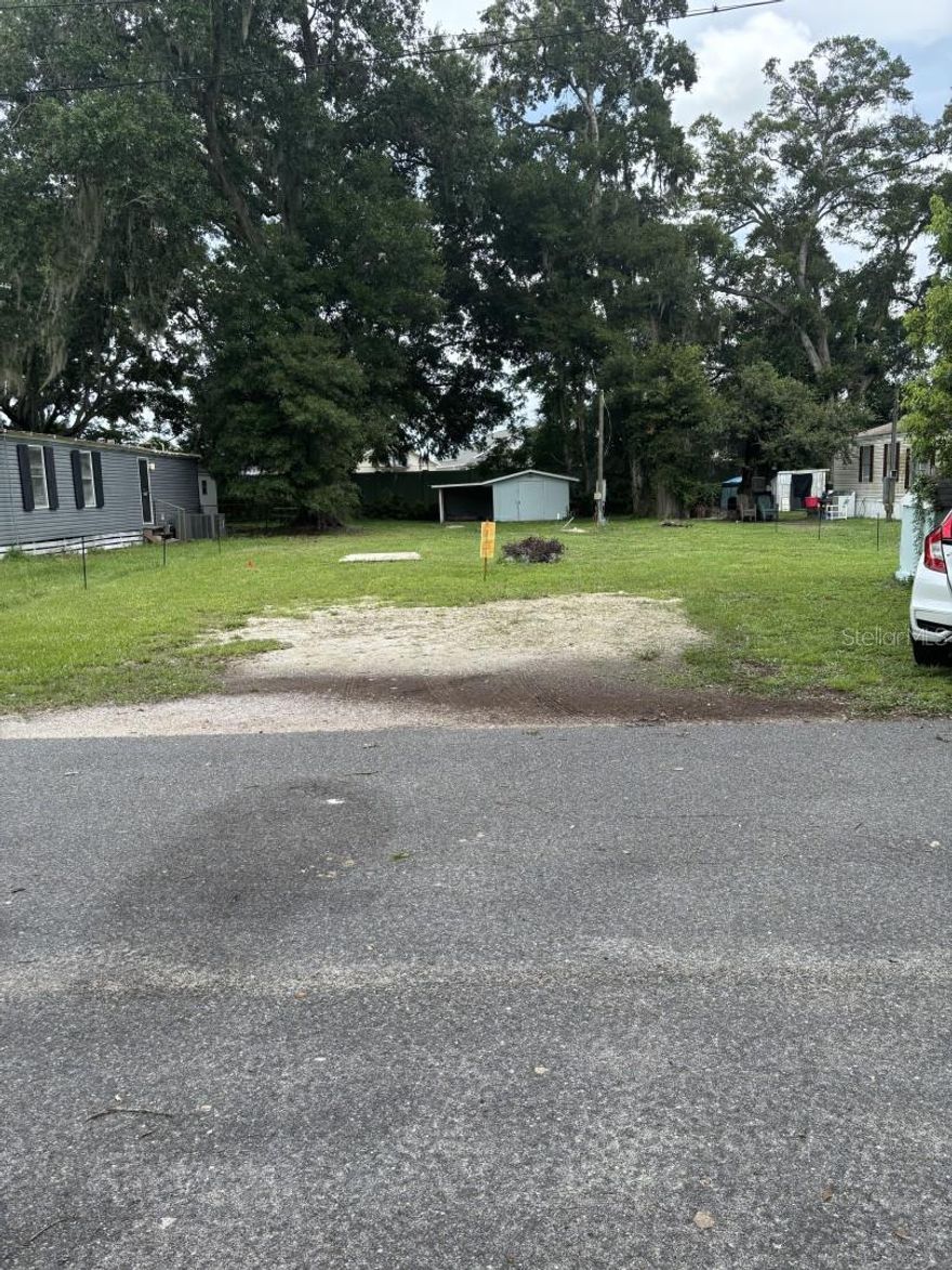 This property at 6379 Co Rd 154A in Wildwood, FL and is a Land/Lot type property for potential development. Situated on a spacious lot size of 6,366 square feet, this property provides Well, Electricity, Shed-roof done with W/D hook-up, attached Carport, Land 125' x 51' Mobile home Removed, Paid $3,575 fee so now it is annexed to the City of Wildwood. Just need permits for single family home or mobile home. Living in RV not permitted. Just surveyed - boundaries marked. Private land-No Park or HOA. The Villages behind property. Walk to Publix, Brownwood Paddock of the Villages & Brownwood Medical. The Land/Lot type home designation provides flexibility for potential buyers or investors to customize the property according to their preferences and needs. The property allows for a blank canvas for creative architectural designs or landscaping projects.5 months of 2 person labor to find mobile home had a Cert of Destruction was in sale for $125k AFTER RENO when they found it -had to remove and destroy could not rent or sell-bought with closing and realtor not losing more paying for lawyers -Into it for $125k + LABOR ASKING $45,000 OWN THE LAND! PARCEL #G08B043 MOBILE HOME REMOVED 125 FEET X 51 FEET=6375 SQ FEET WITH SHED HAS ELECTRIC, WATER, W/D HOOK UPLAND HAS ELECTRIC, WELL, WALK TO PUBLIX, BROWNWOOD PADDOCK & BROWNWOOD MEDICAL, THE VILLAGES ARE BEHIND PROPERTY. NO HOA PRIVATE LAND NO COMMUNITY ASSOCIATION. MOBILE HOME REMOVED ADDRESS- 6379 CR154A WILDWOOD, FL 34785 SORRY NO OWNER FINANCING NEEDS SEPTIC REQ. 400 GALLON
AEROBIC TREATMENT UNIT/SURVEY DONE/-PAID $3500 TO ANNEX TO CITY-ONLY 2 BED HOME OR MOBILE HOME ALLOWED CAN NOT LIVE IN RV PLEASE GO BY & VIEW! In summary, this property at 6379 Co Rd 154A in Wildwood, FL offers a unique opportunity for potential buyers or investors looking to customize a Land/Lot type home to their specific preferences and needs. lot size of 6,366 square feet, this property presents a solid foundation for future developments, renovations, or customizations, making it an attractive option for those seeking a versatile and spacious property in a desirable location.