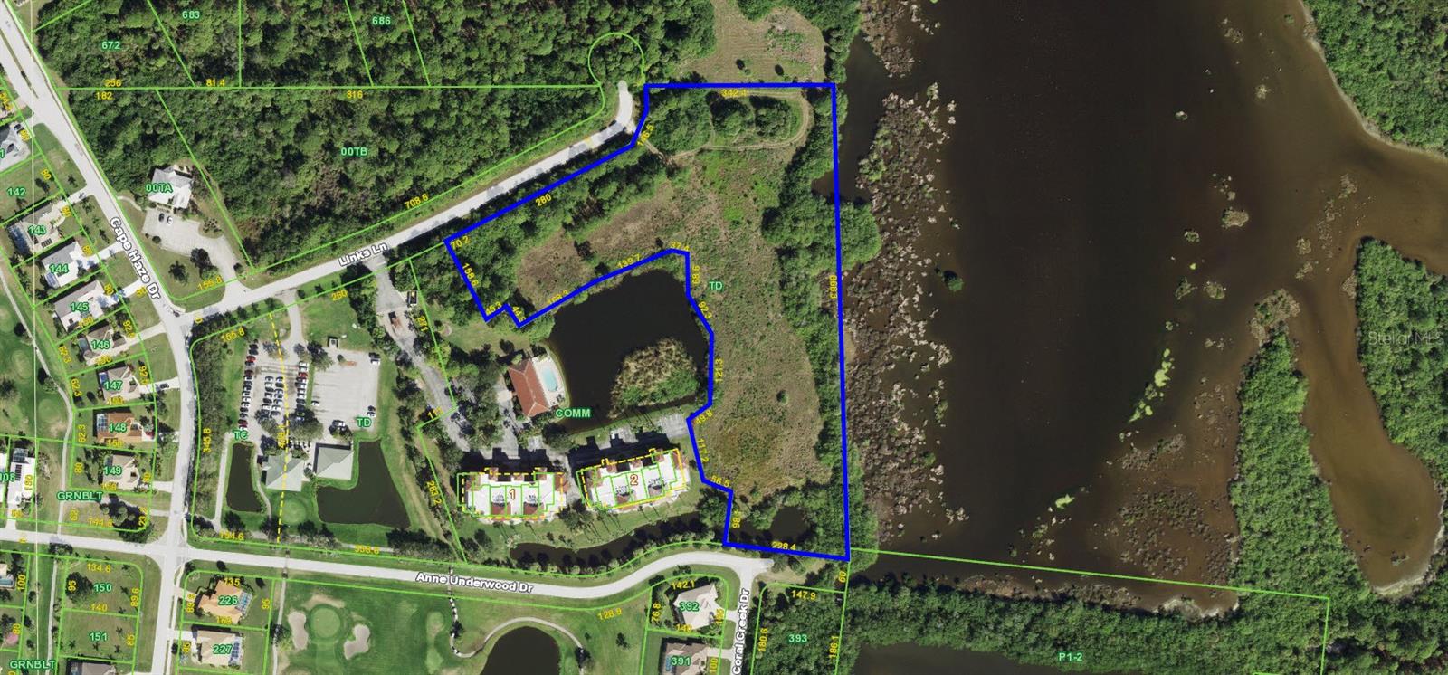 This 7.19 acre parcel is zoned CT which allows residential multi-family uses up to 15 units per acre maximum density or 107 units. The potential for lower density development such as single family is available with 496 feet of paved road frontage and 868 fee of water frontage. Development with 8 to 10 single family estate home sites is a viable option. It is difficult to describe how spectacular the view of the water and surrounding state owned preserve is from this site! The site is located less than two miles from the Boca Grande Causeway and nearby gulf beaches. The site sits on a non-navigable potion of Coral Creek that is an unbelievable wildlife preserve with incredible opportunities for kayaking, fishing and birding. The peacefulness of this location cannot be overstated.