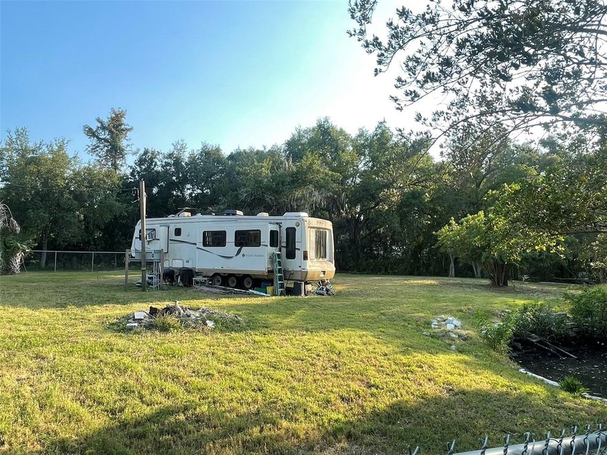 **PRICE IMPROVEMENT** HUGE LOT, AMAZING LOCATION!! Nearly 3/4 of an acre, cleared and fully fenced, ready your dream home! This lot features a small canal which leads right to the Alafia River and beyond to the gulf! This awesome little waterway is perfect to take your kayak or small personal watercraft right from home onto the river - or utilize one of the many local boat ramps & docks, great for taking out the boat with ease. With RSB zoning, this land is an amazing opportunity, with plenty of room to store your boats, toys, and more - even camp out while you build if you choose, as the 36' RV on site is INCLUDED. Conveniently located just off I-75 and Gibsonton Dr, this neighborhood offers both peace of mind and privacy as well as easy access to amenities and conveniences - shopping, restaurants, and so much to do and explore! ALL within a 5 minute radius: Walmart, the AMC Riverview movie theater, Jerry's Dockside Bar & Grill, Freedom Boat Club Alafia River, Cracker Barrel, Dunkin, The River's Edge Bar & Grill, Fatburger, Gretchen's Goodies, Williams Park Boat Ramp, Inter-Bay Moorings, J.B. Gibson Park, and more! Also nearby are the Alafia Scrub Nature Preserve, Pebble Park, Tiki Docks Riverview, Riverview Civic Center & Boat Ramp, and of course, Aldi and Publix. Only 20 minutes to downtown Tampa, and 30 min to Tampa International Airport, this property makes for an easy commute from your retreat by the river. Sellers are also including the 36' RV on site. Call today for details and to come check it out in person!