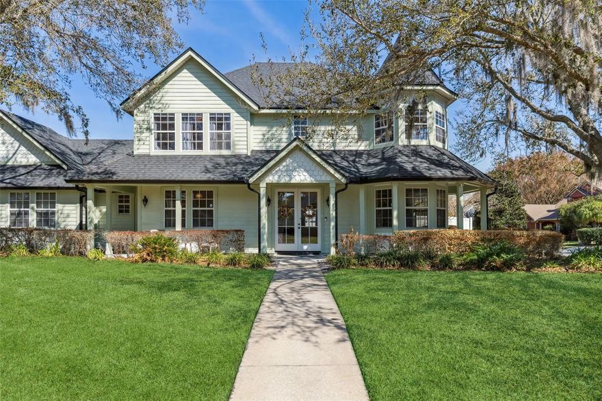 Welcome Home! Located in highly desirable Courtlea Oaks within the golf cart district, this beautifully
upgraded corner-lot home offers luxury finishes and thoughtful design throughout. Boasting natural
light, the cathedral entrance welcomes you with new travertine floors throughout the downstairs living
areas. Fully renovated kitchen features panel-ready built-in refrigerator, dishwasher, 48" double oven
gas range, custom wood island, oversized hood, farmhouse cast iron sink. New crown molding, interior
paint, new doors, designer lighting, recessed LED cans, and in-ceiling speakers enhance the living
spaces. A custom mantle over the wood-burning fireplace adds warmth and character. Upstairs features 3
bedrooms, wood flooring, upgraded bath with marble tile, new vanity, updated plumbing, modern shower
system, and frameless glass. Additional highlights include an office and a versatile bonus room, ideal
for a media room, playroom, or guest suite. Built in murphy bed and shelving, with a charming storybook
corner window adding timeless architectural character. Oversized 3-car garage, custom mudroom with
closet upgrades. New French doors lead to the screened in pool area, with stone accents, large fenced
backyard complete with a firepit and double gate, perfect for entertaining.  Roof (2017), HVAC (2018 &
2020), Water Heater (2021). Move-in ready with premium upgrades in a prime location! Steps away from
Downtown Winter Garden restaurants, shopping, walking trails, parks, and more!