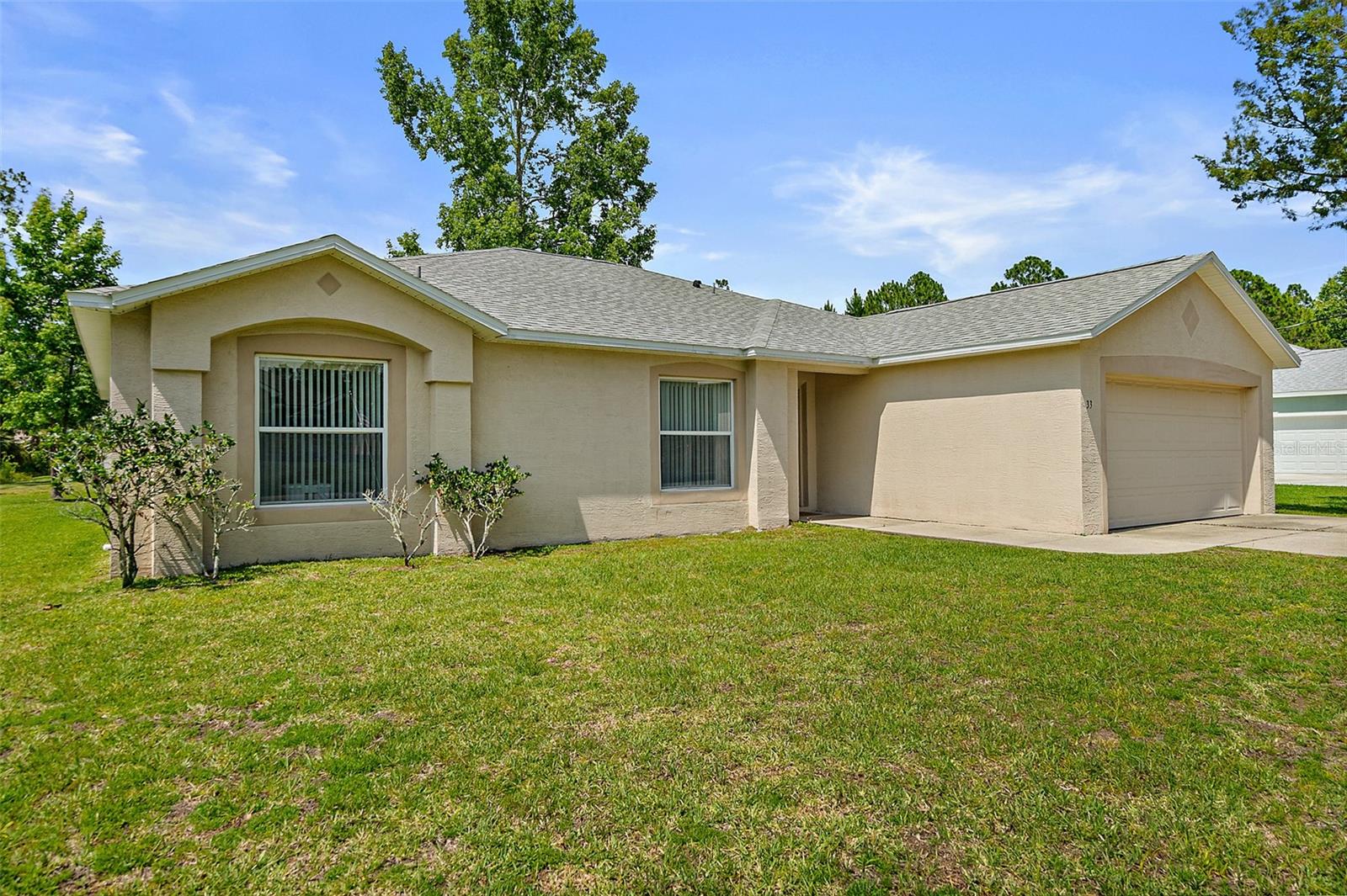 Well maintained 4 bedroom 2 bath2 car garage home in the Lehigh Woods community of Palm Coast.