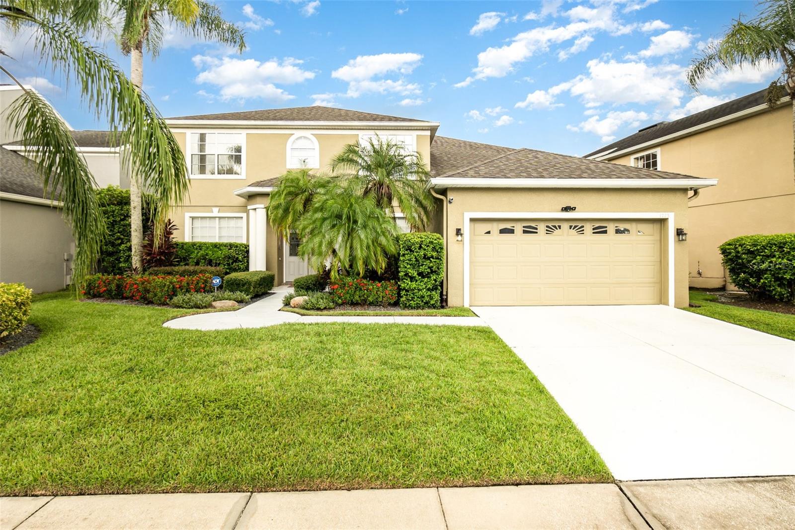 Step into your own TROPICAL OASIS in this stunning 5-bedroom POOL HOME with a PRIVATE BACKYARD RETREAT. Surrounded by a lush natural border and fully fenced for privacy, you’ll enjoy resort-style living every day. The outdoor space is perfect for entertaining, featuring a summer kitchen with built-in grill, double gas burner, refrigerator, storage, and granite countertops—all under the spacious covered lanai. Cool off in your beautifully resurfaced pool or relax in your serene surroundings while catching rocket launches from the Space Coast right from your backyard. Live Every Day Like You’re on Vacation in The Grande Preserve at Cypress Lakes! Inside, luxury waterproof vinyl plank flooring flows throughout the first floor, including the enclosed sitting room with French doors and the spacious guest bedroom that shares the pool bath. Elegant details are everywhere—5-inch baseboards, crown molding, and updated light fixtures create a warm modern feel. The living room features a gorgeous tile inlay feature wall with an ELECTRIC FIREPLACE for a cozy AMBIANCE. The kitchen is the true heart of this home, boasting fresh cabinets, DOUBLE OVENS, KitchenAid appliances, a BRAND NEW COOKTOP AND REFRIGERATOR, GRANITE COUNTERTOPS, and a unique stone veneer subway-tile-style peninsula. Additional upgrades include: Custom closet systems, Utility sink in the laundry room, Gutters, Safe Racks® garage overhead storage, Professionally tinted windows. COMMUNITY AMENITIES RIVAL ANY RESORT, with a clubhouse, lounge, billiards, fitness center, resort-style pool with waterslides and lap lanes, tennis and pickleball courts, playgrounds, dog parks, basketball courts, and sports fields. Located just minutes from Waterford Lakes Town Center shopping and dining, an easy drive to Oviedo on the Park, UCF, and Siemens, and ideally situated halfway between Disney and Florida’s East Coast beaches—this home offers the ultimate Florida lifestyle. Roof 2018, AC 2017