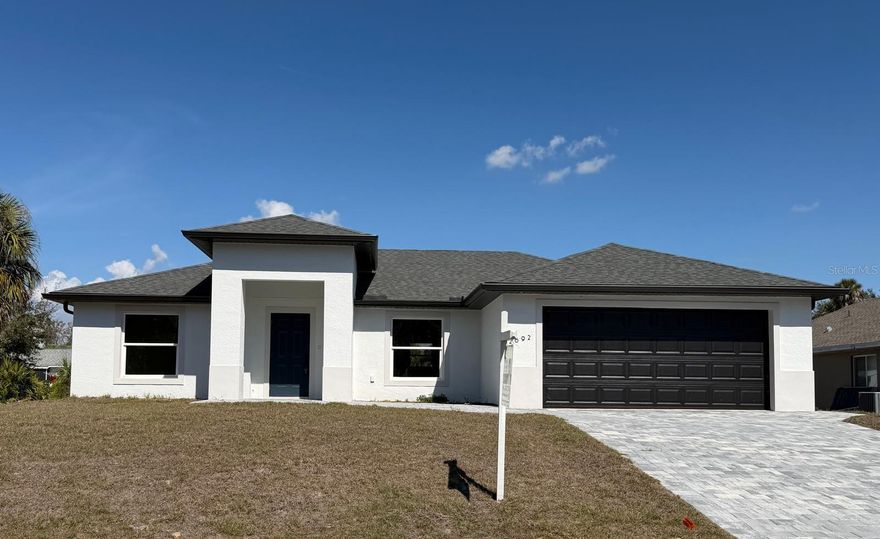 MOVE IN READY! Welcome to your dream home in North Port, FL! This stunning new construction boasts a modern and inviting open floor plan, designed for both functionality and luxury living. With 3 spacious bedrooms and 2 elegantly appointed bathrooms, this custom-built residence offers the perfect blend of comfort and style. Step inside and be greeted by the fireplace in the spacious living room, soaring high ceilings that create an airy and expansive atmosphere throughout the home. The heart of this abode is the gourmet kitchen, featuring granite countertops and top-of-the-line stainless steel appliances. Enjoy privacy and peaceful views in this beautiful home backing onto a greenbelt, with no rear neighbors and added sense of space.This house is Conveniently located on a street with new homes around very close to I-75, shopping, dining and many local beaches. Also located in North Port close to several schools and a short car ride away from Centennial Park and Pool as well as a variety of dining and shopping options including Cocoplum Shopping Center. Take advantage of all the area has to include multiple golf courses and TWO Major League Baseball Spring Training stadiums! Within 15 minutes drive you can be at WELLEN PARK, the new Atlanta Braves Training Stadium, Cool Today Park, and the highly anticipated new Costco store!!! Close to shopping, restaurants, and River. Within 25 minutes drive , you can be at Manasota Beach on the Gulf of Mexico, Aquatic Center, and much more. No HOA/ CDD!!! NO FLOOD INSURANCE REQUIRED! Call now to schedule a showing before this home passes you by!