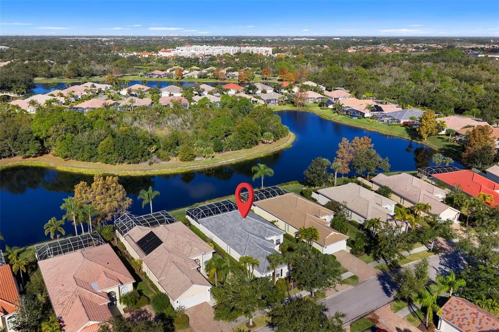 Photo of 7662 Uliva Way, Sarasota, FL 34238 (MLS # A4677699)