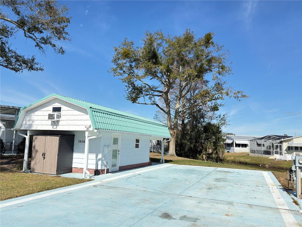 Photo of 5036 Shore Line Drive, Polk City, FL 33868 (MLS # P4935807)
