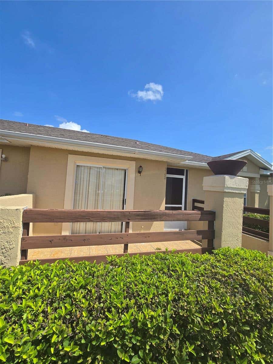 Photo of 3194 Sandy Shore Lane, Kissimmee, FL 34743 (MLS # O6412148)