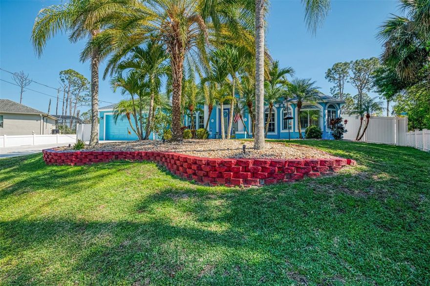 Seller is motivated and will consider all offer! Extraordinary Custom Home with Heated Pool & Spa on a Stunning Oversized Lot! This impressive 3/4-bedroom, 2-bath, 2-car garage home offers 2,370 sq. ft. under air, blending luxury, comfort, and top-tier upgrades! Situated on an oversized 11,504 sq. ft. lot, this mini estate is completely fenced and backs onto a peaceful greenbelt, creating a serene and private retreat. Step inside and experience 10-foot ceilings adorned with elegant crown molding, adding a touch of grandeur throughout. The dedicated office, complete with 8-foot glass French doors and plantation shutters, provides flexibility as a fourth bedroom if needed. Every inch of this home boasts high-end upgrades, including new tile flooring in the bedrooms and bathrooms, new plumbing fixtures, and new ceiling fans and lighting in every room—including the porch and garage. The gourmet kitchen is designed for both function and style, featuring new stainless-steel appliances, a convection double oven, abundant counter space, a large breakfast bar, and a charming breakfast nook with aquarium glass that frames breathtaking views of the sparkling pool. A formal dining room with mirrored walls and an eye-catching window adds a sophisticated touch. The primary suite is a true retreat, offering an expansive layout with a private sitting area, a luxury en-suite bathroom with dual sinks, granite countertops, a separate garden tub, and a walk-in tiled shower. The additional bedrooms are generously sized, each with ceiling fans and ample closet space. Step outside, and prepare to be amazed! The resort-style 6 foot deep heated pool and spa are surrounded by an expansive 26-foot lanai and an extended 32x36 pool deck, complete with a safety gate, dolphin fountain and a second storage shed for pool equipment. Beyond the pool cage, the property extends with a privacy easement, offering even more space to enjoy. This home is packed with upgraded features, including a whole-house reverse osmosis water purification system, new well pump, new AC (2023), new hot water heater (2022), brand new pool heater and pool pump, whole-house surge protector, fresh interior and exterior paint, a new shed, and a security system with built-in speakers. The garage features epoxy flooring, while the driveway and front porch showcase a custom dolphin design. There's even expanded parking to accommodate an RV, boat, or extra vehicles. The professionally landscaped yard is a tropical paradise, featuring $135,000 in premium landscaping, including mature palm trees, flowering shrubs, cherry trees, colored rock with weed guard protection, and custom concrete curbing around the front, side, and backyard.  Home includes Hurricane shutters too. Located in North Port's desirable new home area, this spectacular property offers easy access to I-75, shopping, dining, Town Center Mall, and more. This home is one-of-a-kind—schedule your showing today!