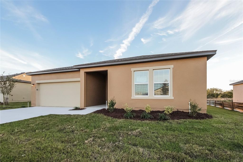 Photo of 158 Hidden Lake Loop, Haines City, FL 33844 (MLS # O6350791)
