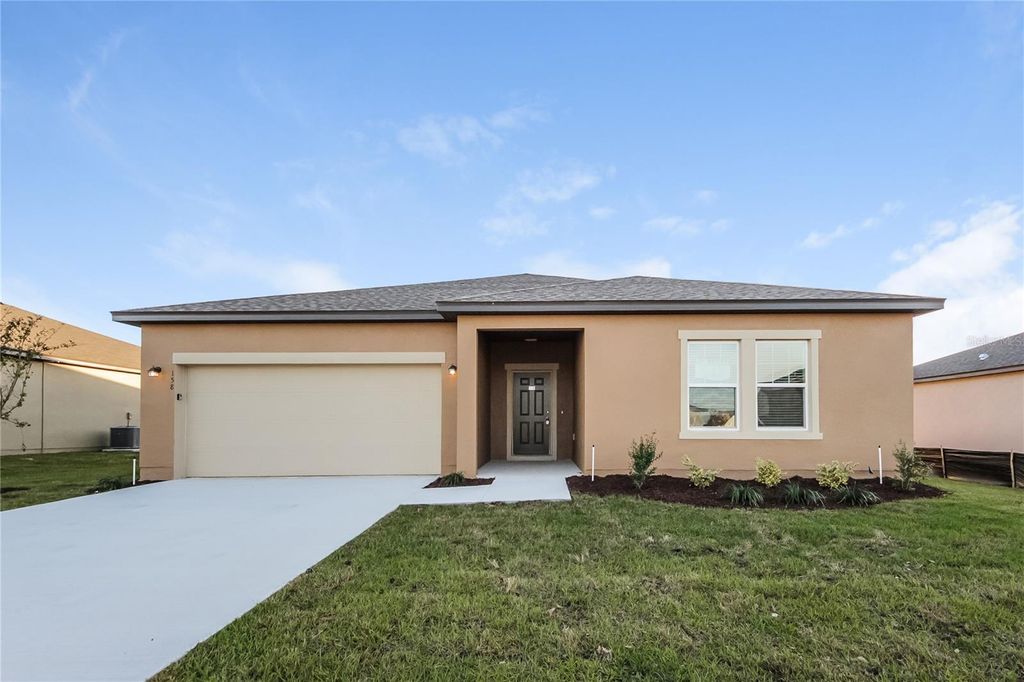 Photo of 158 Hidden Lake Loop, Haines City, FL 33844 (MLS # O6350791)