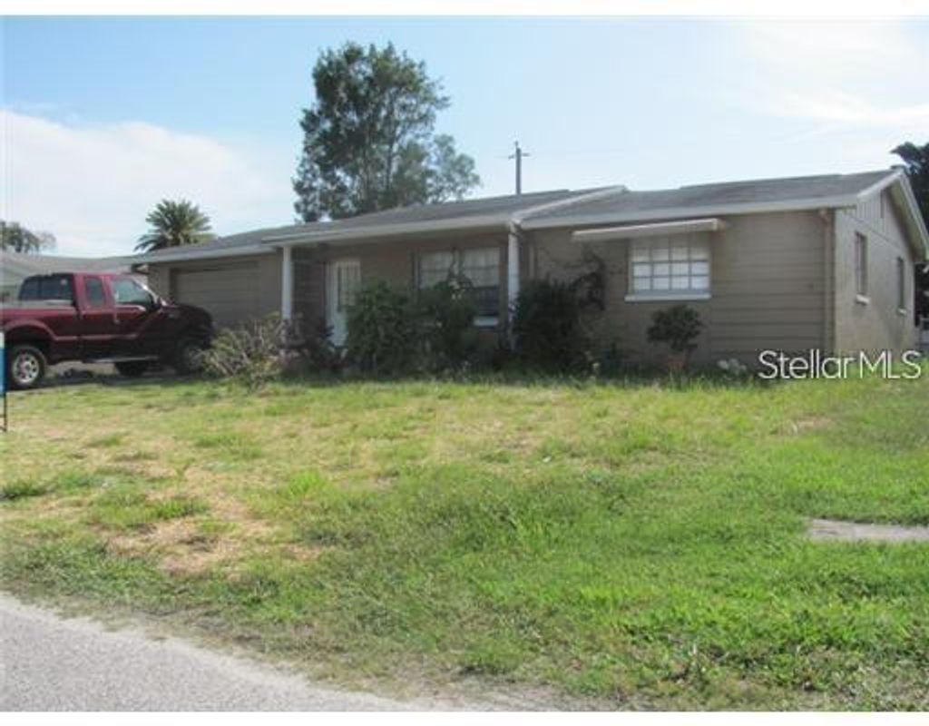 Photo of 3445 Wiltshire Drive, Holiday, FL 34691 (MLS # W7883855)