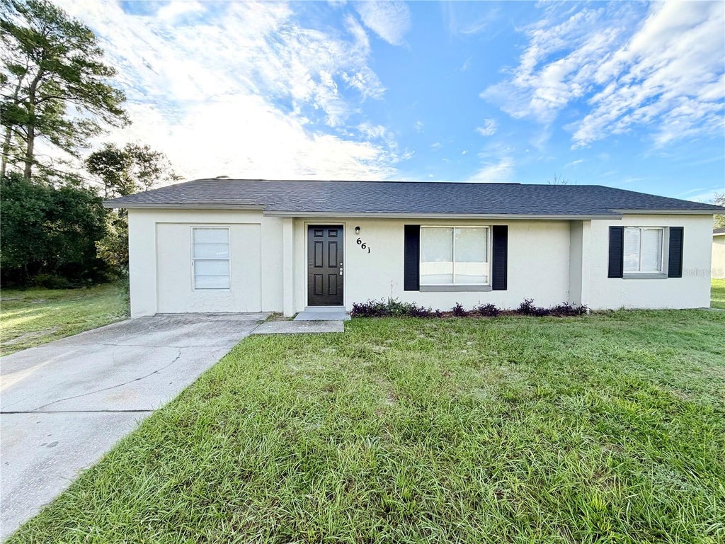 Photo of 661 Gulliver Avenue, Deltona, FL 32738 (MLS # O6446570)