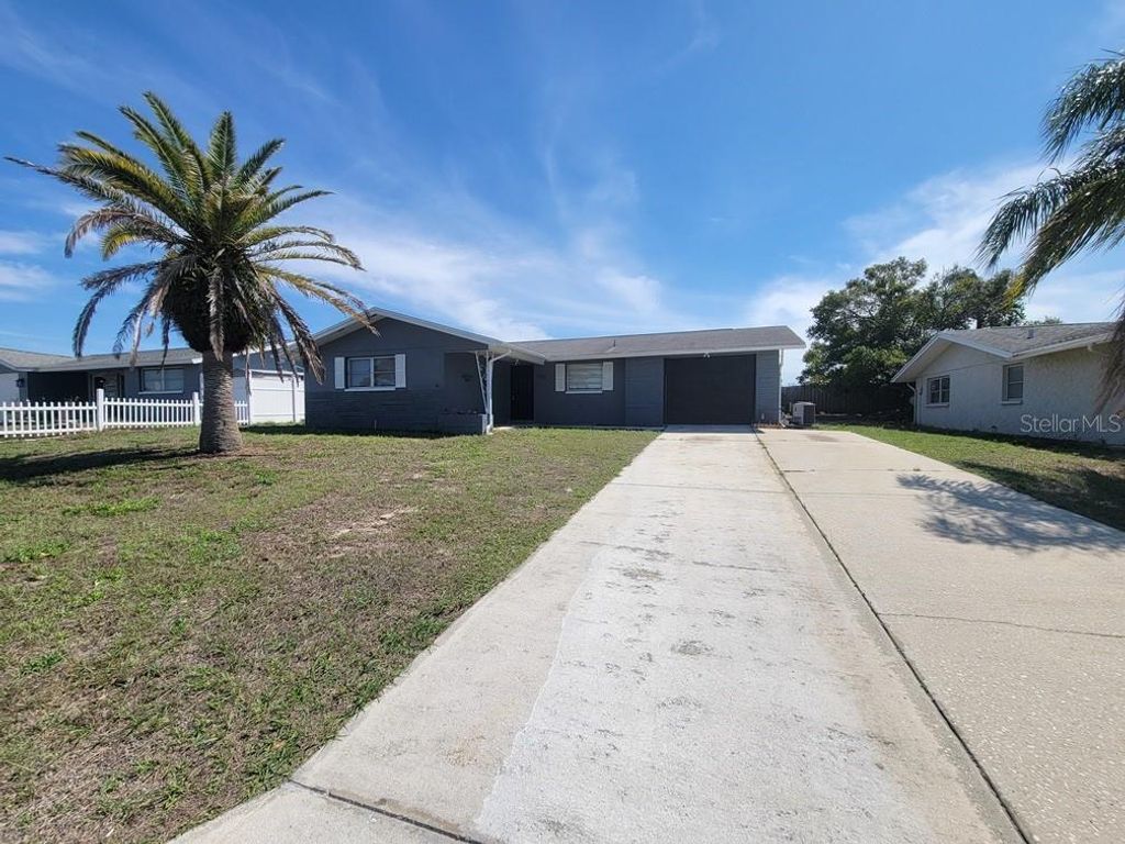Photo of 7920 Pineapple Lane, Port Richey, FL 34668 (MLS # W7884140)