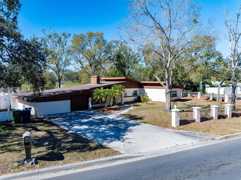 Photo of 11608 N Blvd, Tampa, FL 33612 (MLS # TB8470266)