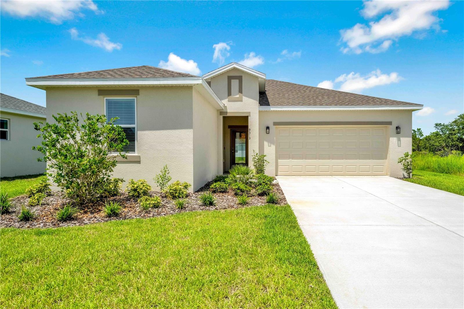One or more photo(s) has been virtually staged. Ready for Immediate Occupancy! Seller is offering $5,000 to be used toward the buyer’s closing costs and prepaids, or applied toward the first year of HOA dues! This brand-new 3-bedroom, 2-bathroom home with a 2-car garage offers 1,550 sq ft of living space (2,069 total) and is located in the highly sought-after gated community of GlenLakes Country Club! Step inside and be welcomed by a spacious, open layout ideal for modern living.
The kitchen boasts rich wood cabinetry, granite countertops, stainless steel appliances, a breakfast bar that seats three, LED lighting, and beautiful, easy-to-maintain flooring that runs throughout the entire home. The bright and airy living room includes sliding glass doors that open to the backyard.
Enjoy the convenience of an indoor laundry room, complete with washer and dryer. The generous primary suite features a walk-in closet and a private bath with dual sinks, a tub/shower combo, wood vanity, and sleek LED lighting. Two additional bedrooms are located near the guest bath, which includes granite counters, tile-surround tub/shower combo, and matching cabinetry.
This home is nestled within GlenLakes, home to a stunning 18-hole championship golf course and a vibrant clubhouse offering a full-service restaurant and the popular 19th Hole Grill & Bar. Gated community with 24/7 security for peace of mind. Conveniently located near major shopping centers, restaurants, and everyday essentials.
Drive your golf cart to the many amenities: fitness center, tennis and pickleball courts, lakeside pool and spa, game and card rooms, billiards, library, yoga studio, dog park, playground, and Veterans Memorial. With over 100 clubs and social groups to join, there’s always something to enjoy!
Located just 1 hour from Tampa, and close to beaches, Pine Island sunsets, boating, fishing, kayaking, and more. HOA dues include cable and internet for added value and convenience!