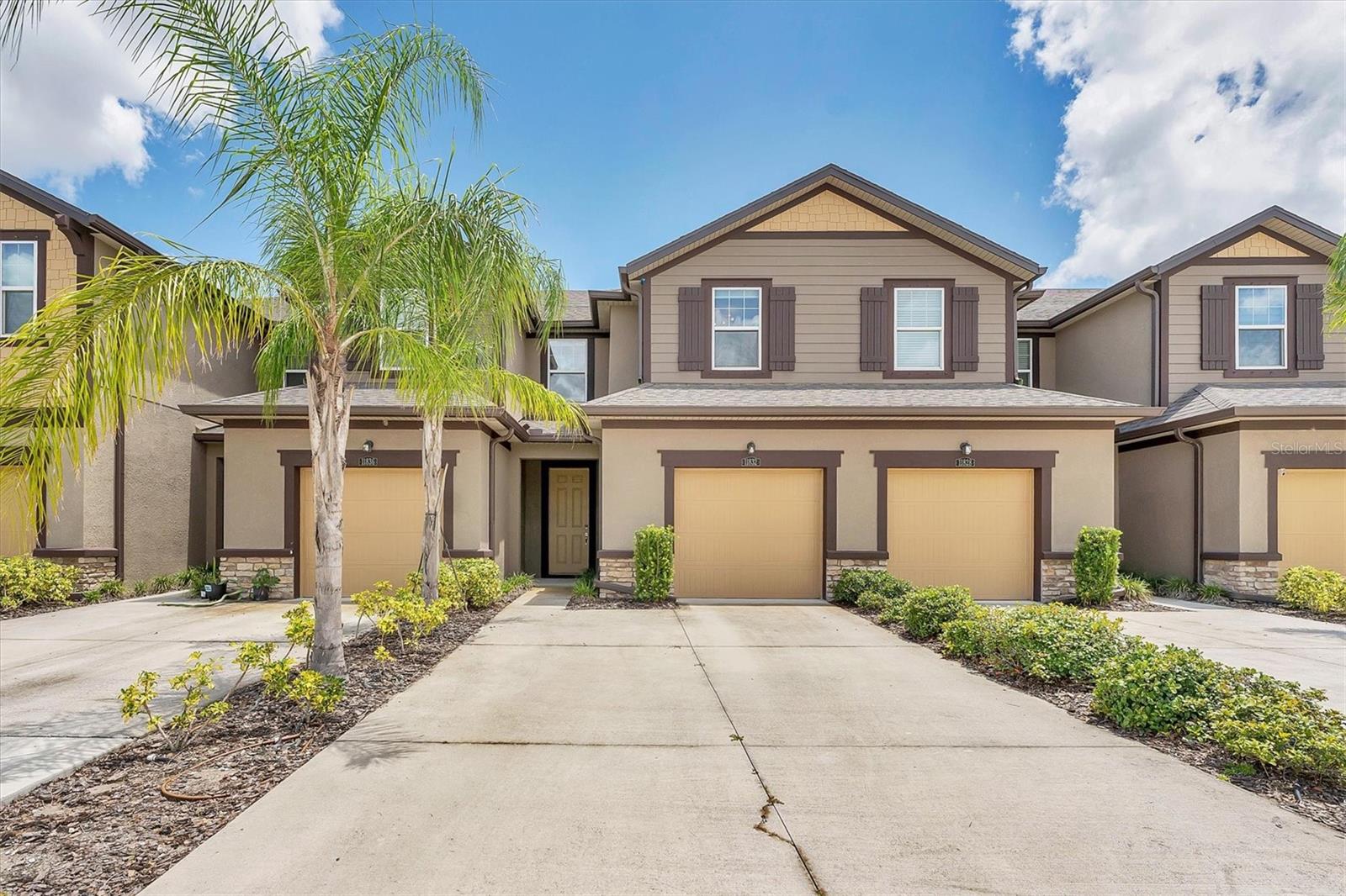 Available 8/22/25. Welcome to your contemporary, spacious townhouse in Harmony of Lakewood Ranch. Still looks and smells like new! Complete with ceramic tile plank flooring throughout the main living areas on the first level, this two-story townhouse has 3 bedrooms / 2.5 bathrooms, and a one-car garage with double driveway for parking. Inside you'll find a modern kitchen with gorgeous quartz countertops, a huge island, SS appliances and 42-inch upper cabinets. A generous living area, half bath, under-stairs pantry, and screened lanai to relax on complete this level. Go upstairs and discover the spacious primary bedroom with en suite bath featuring double vanity sinks and quartz countertops. Laundry room with washer & dryer are on this floor, as well as two roomy bedrooms situated on the opposite side. Harmony at Lakewood Ranch features walking trails through a conservation area surrounding the community, a state-of-the-art fitness center, a clubhouse, an events lawn, and a beautiful pool. In a short distance are the UTC shopping district, Lakewood Ranch Main Street, LECOM Dental School, and the energetic city of Sarasota. Come see this townhome! You will be excited from the time you open the front door! Sorry no smoking, no pets. $50 application fee per adult. First, Last, & Sec. Deposit of $1,500 moves you in.