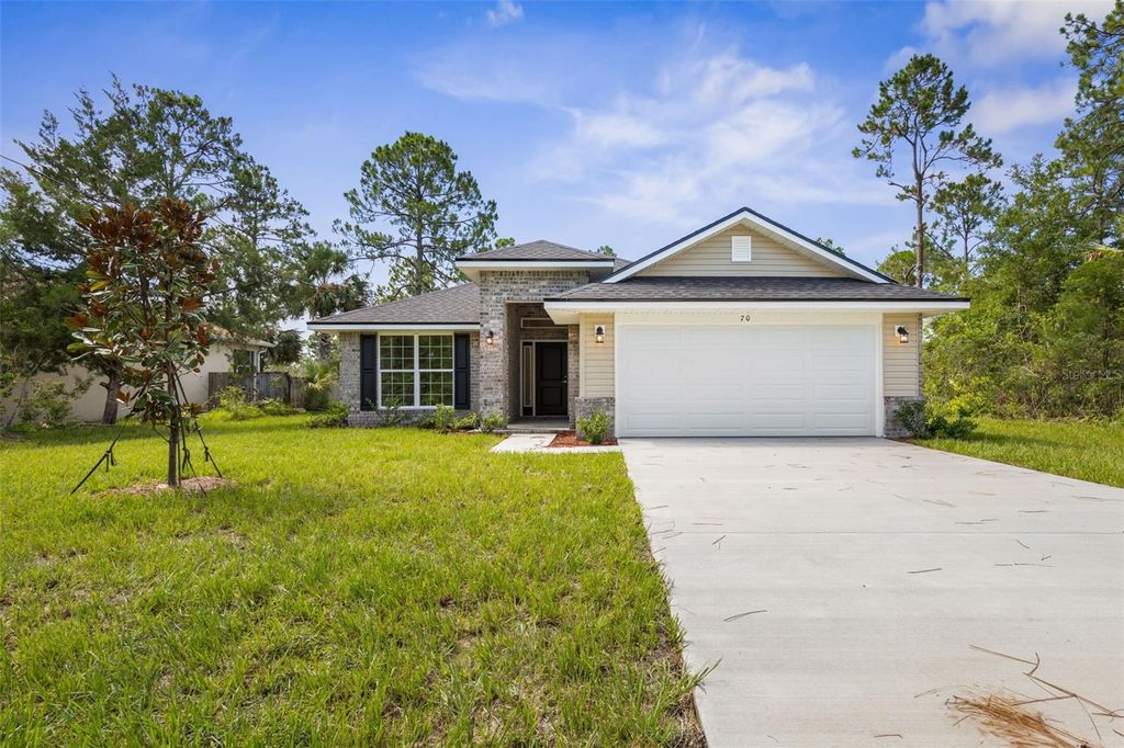 Photo of 23 Brownstone Lane, Palm Coast, FL 32137 (MLS # FC315528)