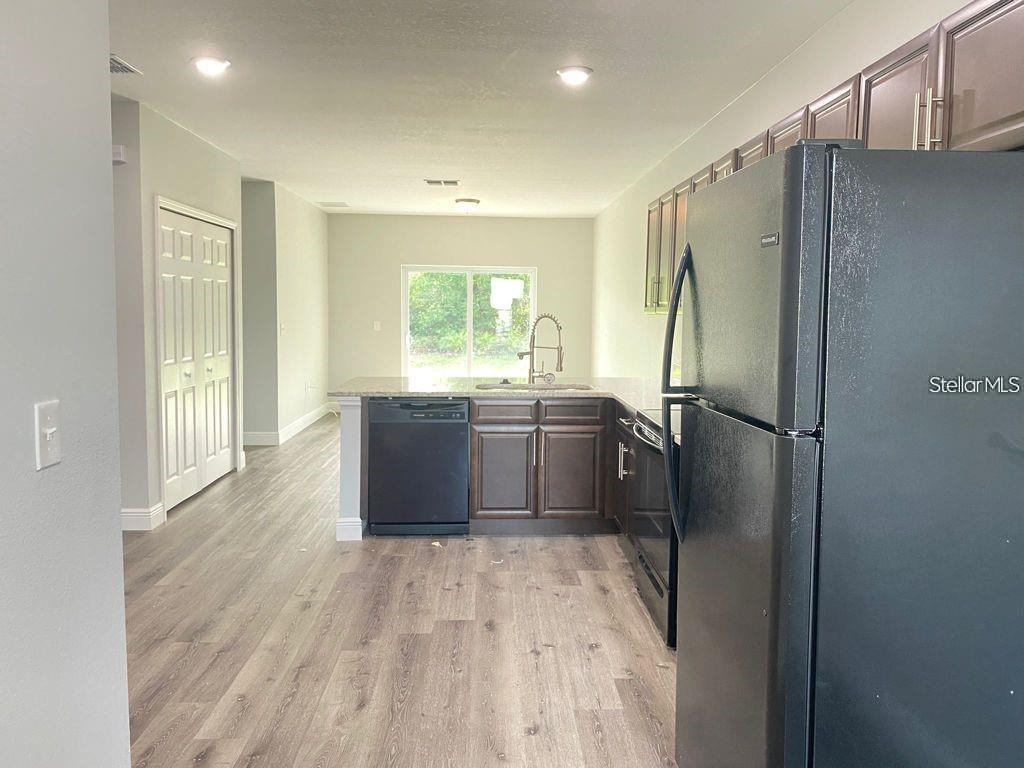 Photo of 363 Dundee Drive, Poinciana, FL 34759 (MLS # S5160101)