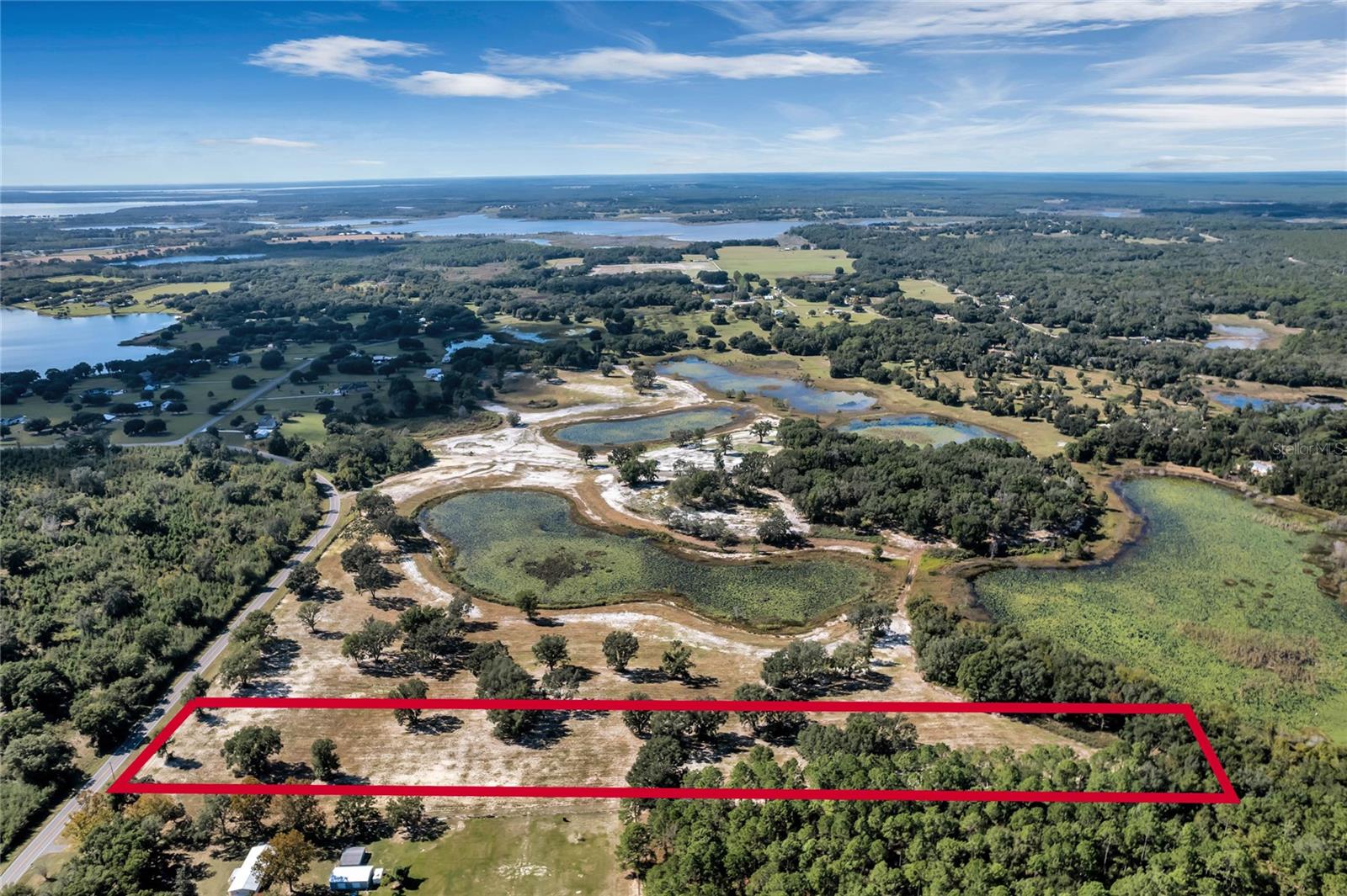 This beautiful nearly 10 acre parcel is just minutes north of Umatilla in the beautiful countryside of Marion County. This parcel has one small pond on the northwest side but otherwise dry. Present owner has planted the entire parcel for pasture. There is a boundary fence on the entire 94.94 acres but the owner is willing to sell off this 8.36 acre parcel, so there are two sides of the parcel that are fenced. There is an entrance gate onto SE 180th Street Road as well. Well and septic required. Agricultural exemption should be enacted for next year's taxes. Call to schedule a private tour today! This is one beautiful piece of property just waiting for you to build on your private piece of paradise.