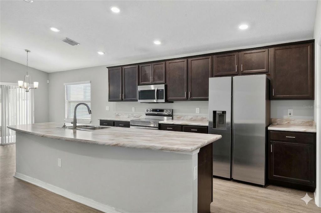 Photo of 1054 Silas Street, Haines City, FL 33844 (MLS # O6390839)