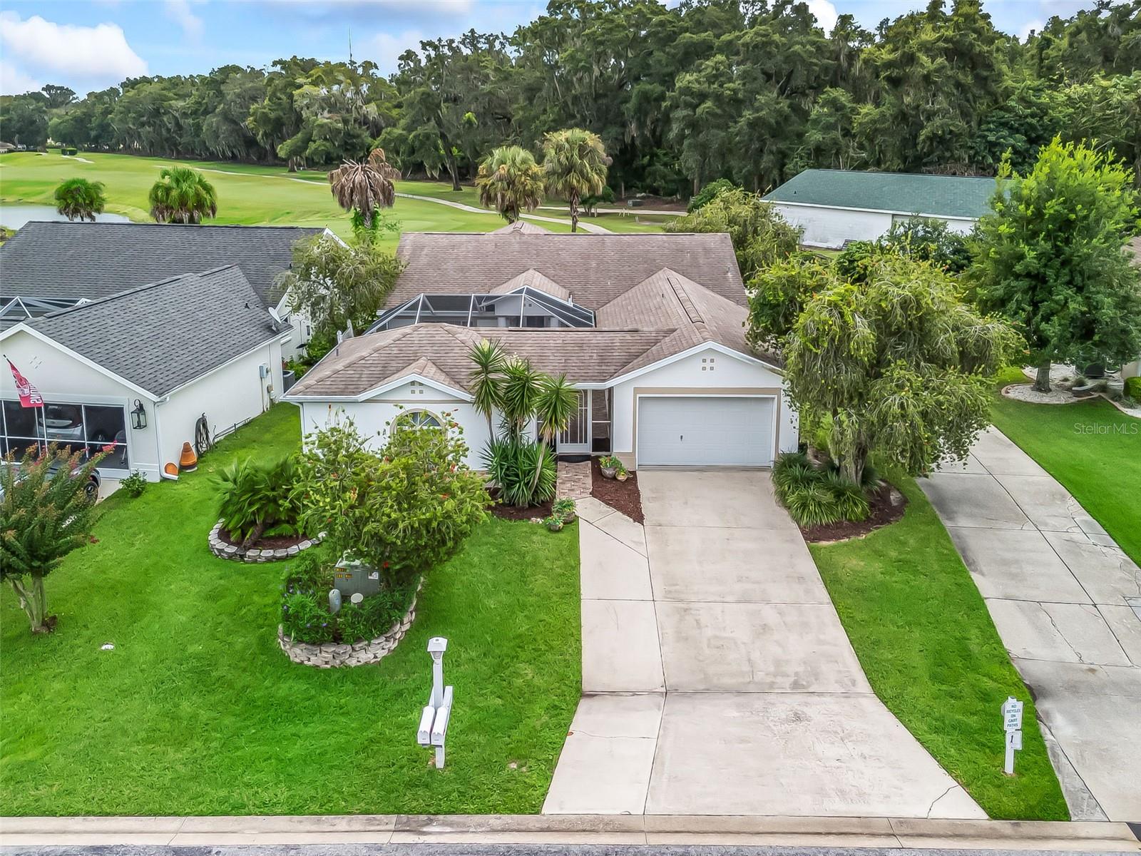 Beautiful recently updated and highly sought after Bamboo Model floor plan (3 bedroom/3 bath) in Ocala Palms with views of the 3rd green and golf course. This lovely floor plan has a spacious 2 bedroom, 2 bathroom main living space with bright living room with French doors opening to the large screened patio with spectacular views of the golf course, enjoy the freshly updated kitchen cabinets with granite countertops, a large primary suite that also opens to the patio, with a large walk in closet and updated en-suite, and guest room and bath in the main residence. Just outside there is a screened courtyard with a private entry to the in-law suite perfect for family or guests that enjoy a little extra privacy. The home is move in ready for the upcoming fall/winter season! Don’t miss this special opportunity!