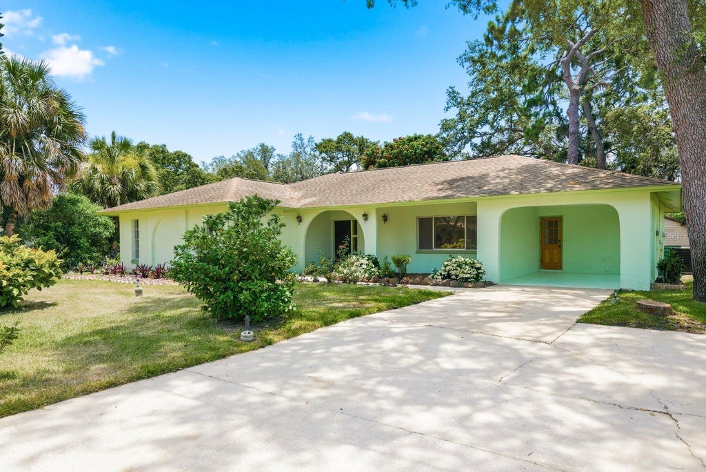 Photo of 1603 Mexico Avenue, Tarpon Springs, FL 34689 (MLS # TB8515395)