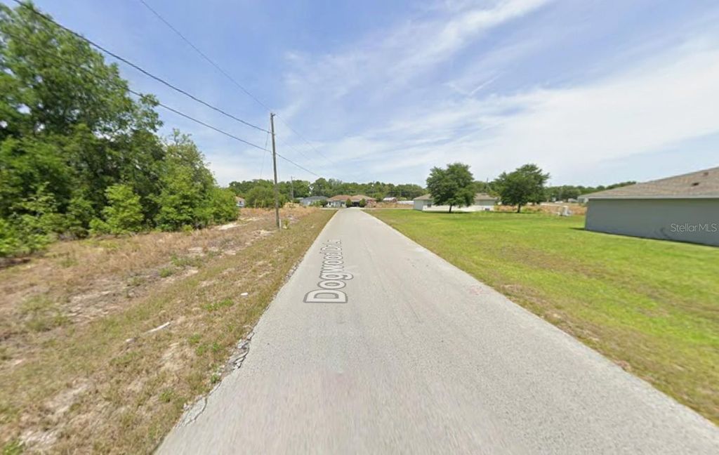 Photo of 11 Dogwood Drive Lane, Ocala, FL 34472 (MLS # K4903588)